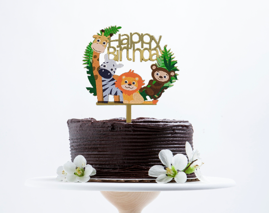 Childrens Birthday Cake With A Safari Animal Design Stock Photo - Download  Image Now - iStock